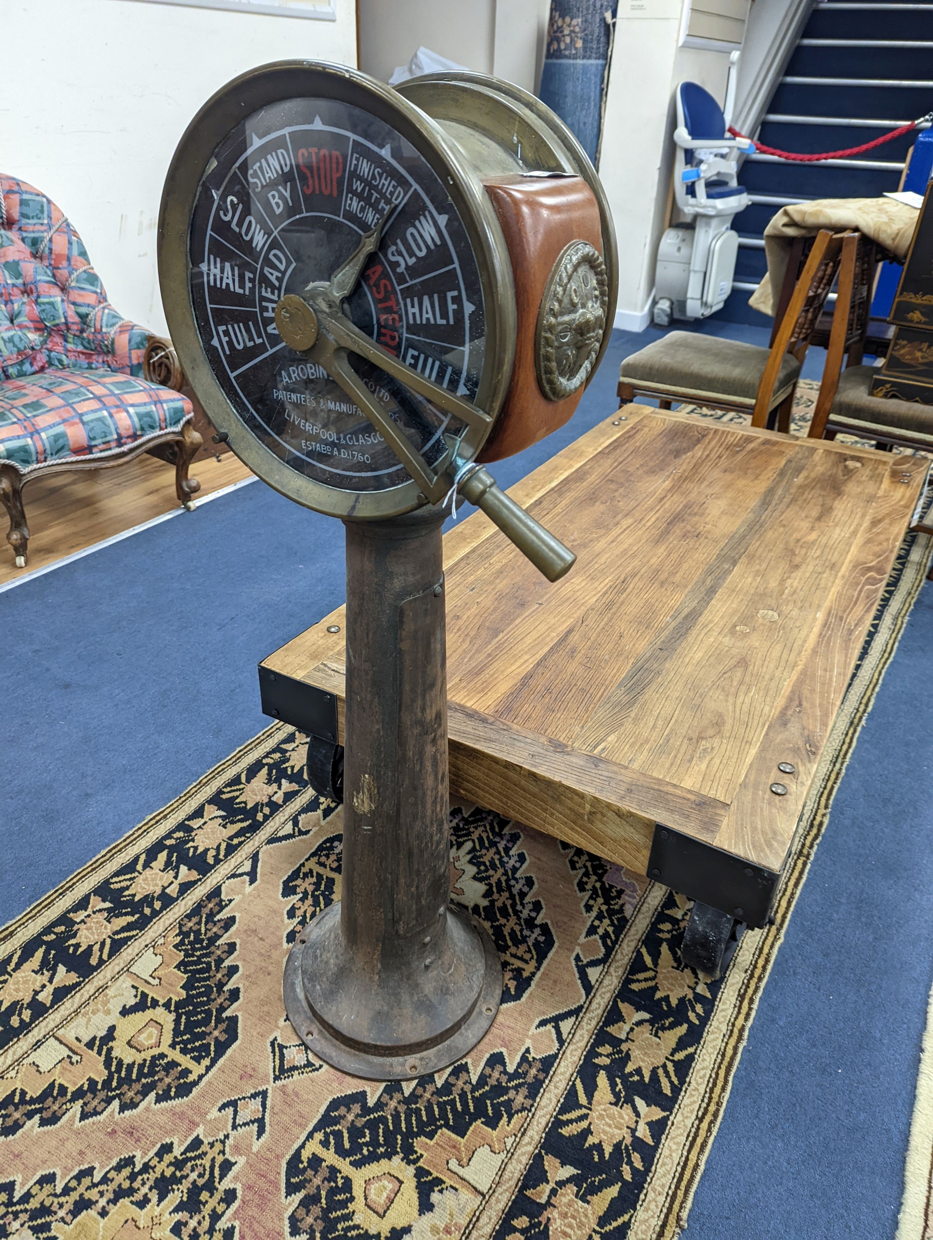 An A. Robinson & Co. Ltd. brass and copper mounted ship's telegraph, height 114cm